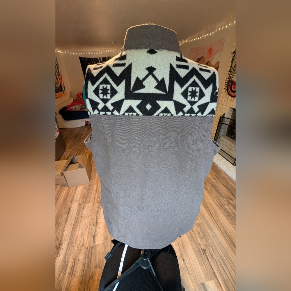 Men's Carharrt sherpa vest with Pendleton wool fabric detailing.